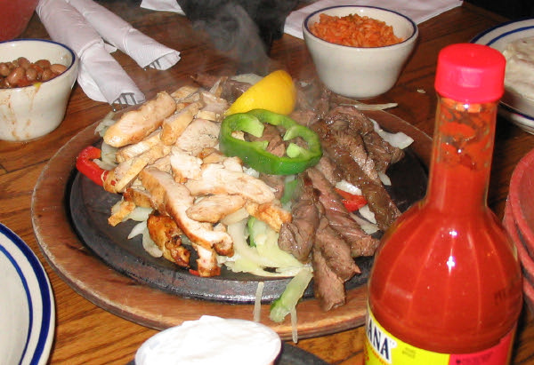 [Hot Iron Skillet with Fajitas and Steam]